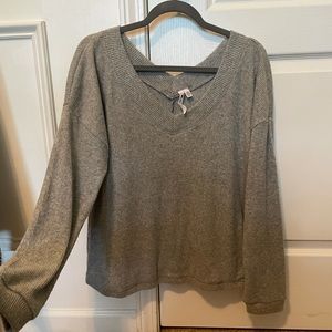 Lightweight gray V-neck sweater